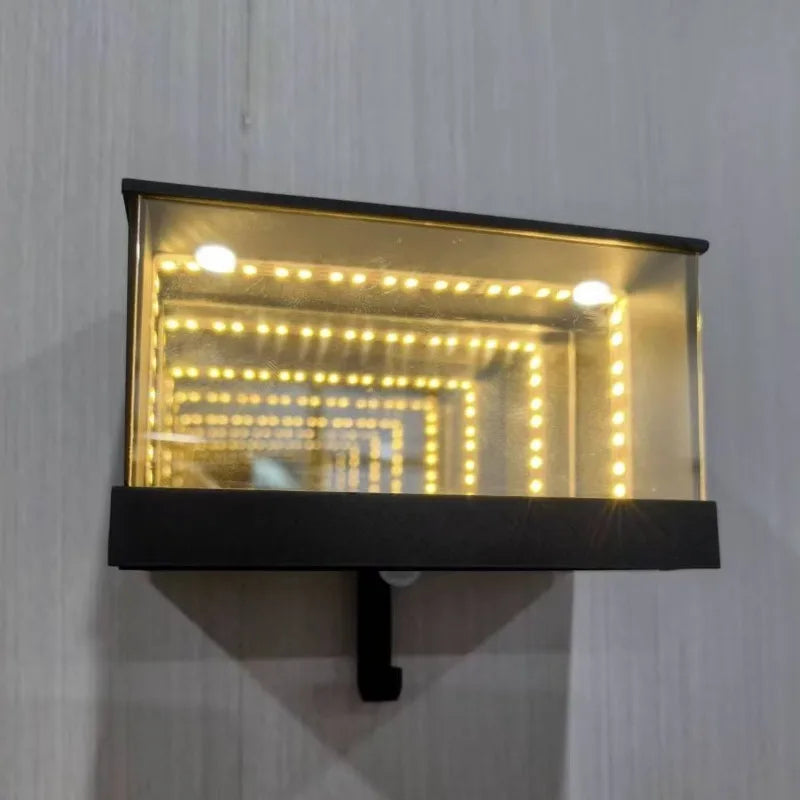 Wall-mounted light fixture with LED lights on a gray wall