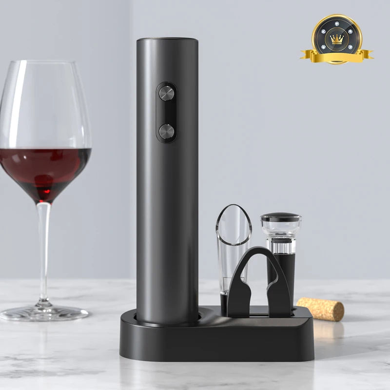Black electric wine opener with wine glass and accessories on a light background